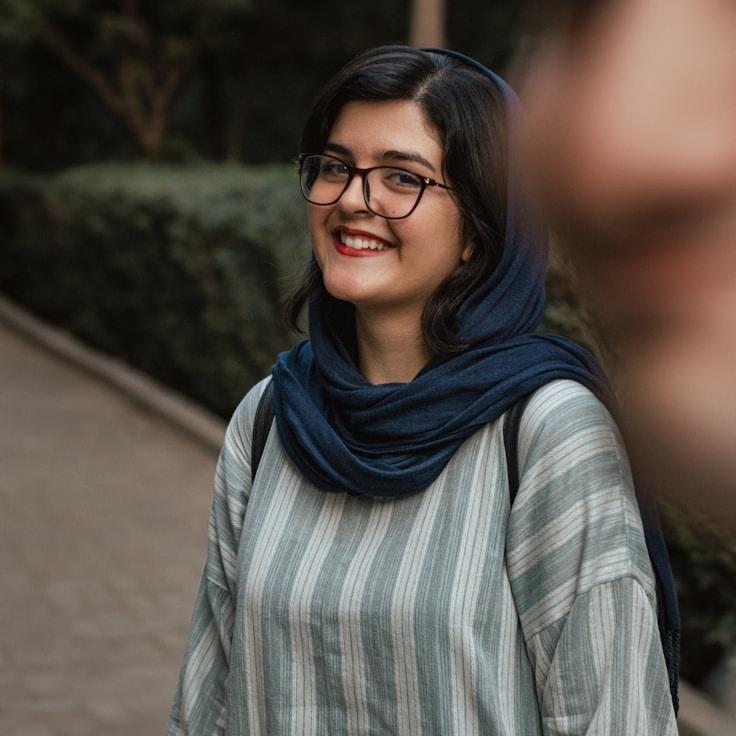 Aria Kapoor, Client Relations Director, discussing corporate gifting strategy with business clients